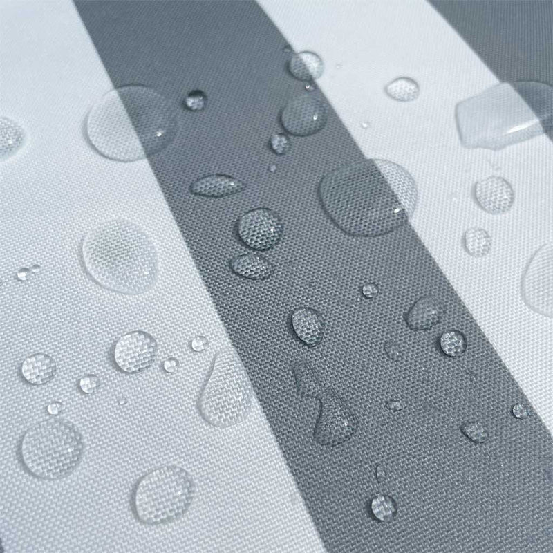 Close up picture of water droplets on a Grey & White Striped Waterproof Outdoor Cushion