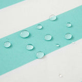 Close up picture of water droplets on a Turquoise & White Striped Waterproof Outdoor Cushion